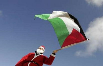 Santa in Nonviolent protest in Bethlehem Palestine